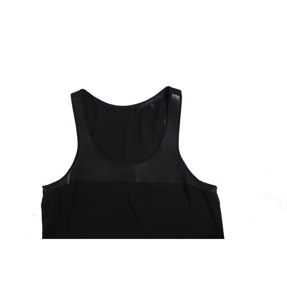 Victoria Beckham Black top with leather details.